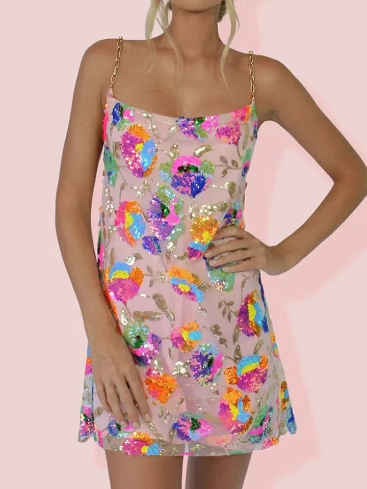 Enchanting women's floral mini dress, perfect for summer party or vacation style with spaghetti straps.