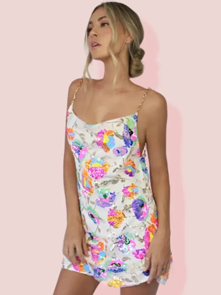 Stylish women's floral mini dress, perfect as a summer party dress or casual beach wear.