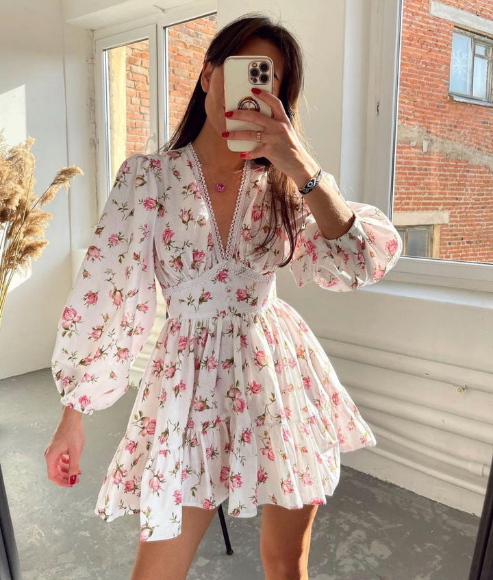 Elegant women's floral mini summer dress with a V-neck and ruffles, perfect for casual parties or vacation.