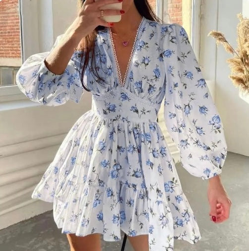 Casual women's floral ruffle mini dress with a flattering V-neck, ideal for summer vacations and elegant gatherings.