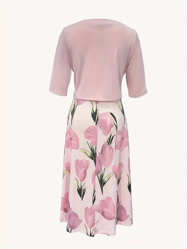 Women's elegant two-piece floral jacket and maxi dress set. A stylish coordinating ensemble for formal or party wear.