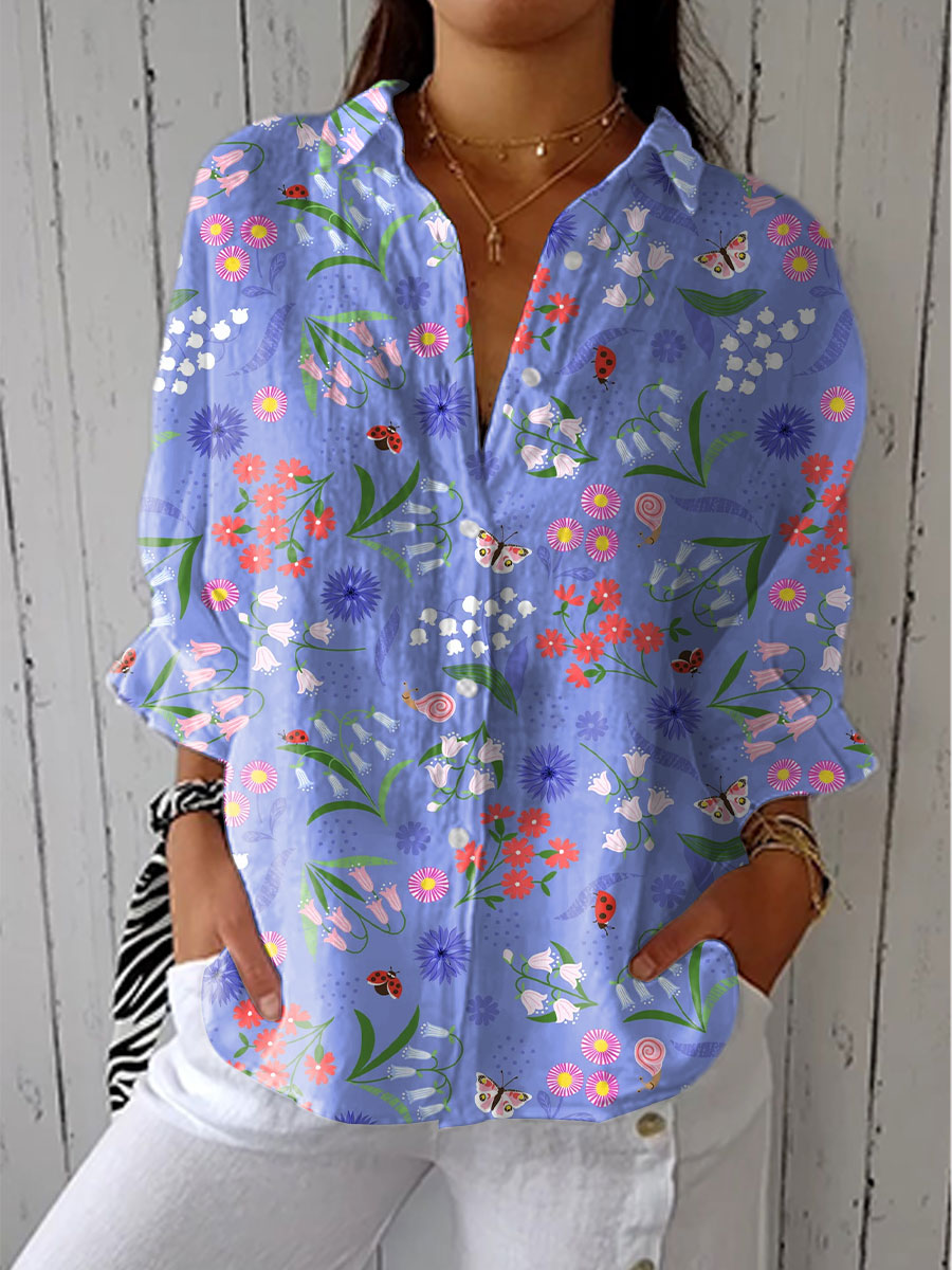Elegant Women's floral print button-down long sleeve blouse. Meadow-inspired design, ideal for spring & summer fashion.
