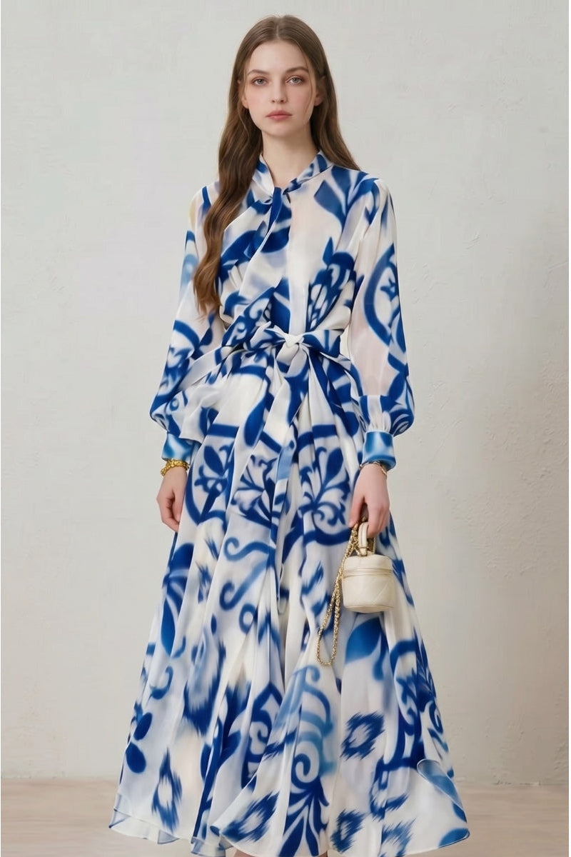 Elegant women's floral print long sleeve belted maxi dress, perfect for spring/summer occasions.