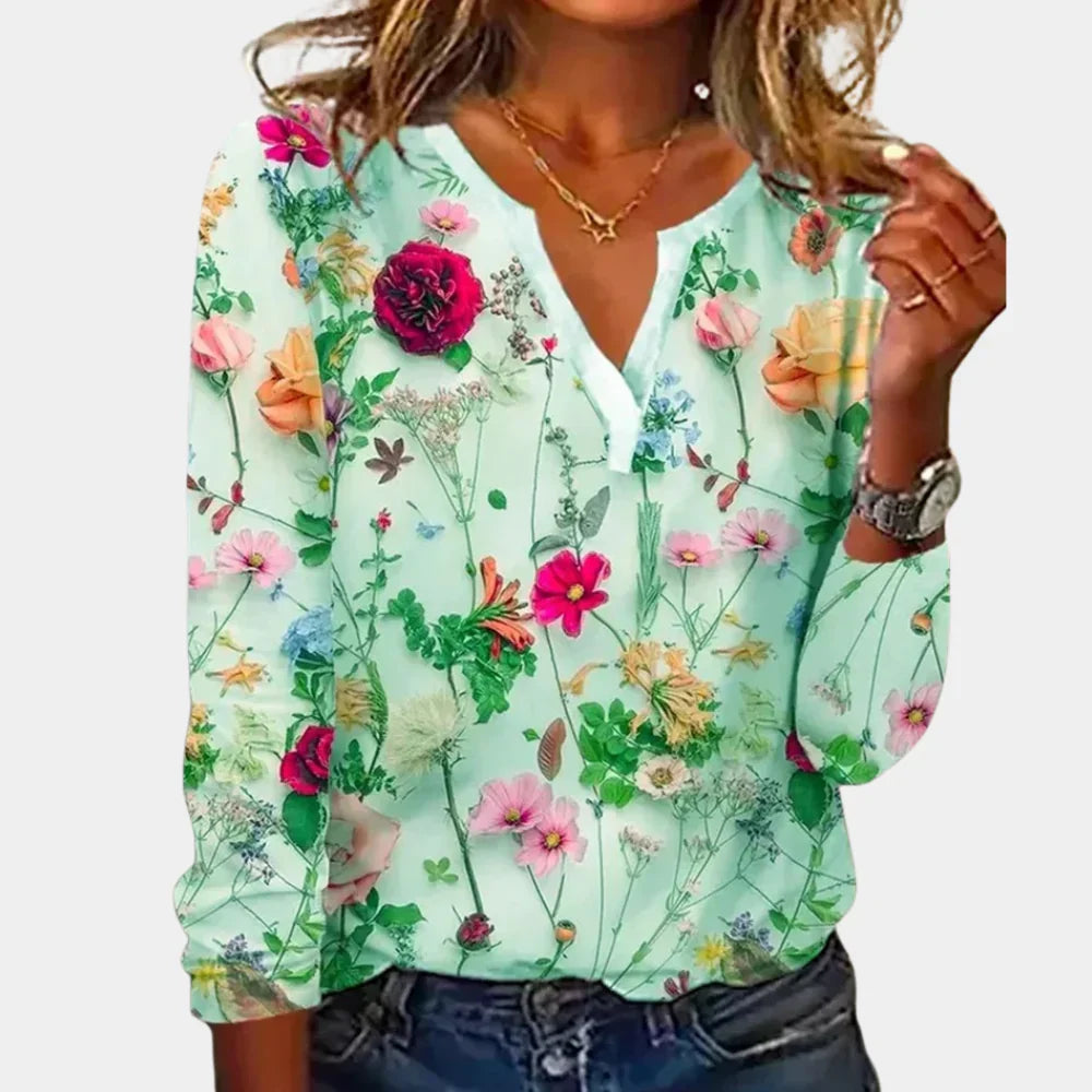 Elegant women's floral print long sleeve blouse. Perfect for casual, office, or evening wear. Chic spring fashion.