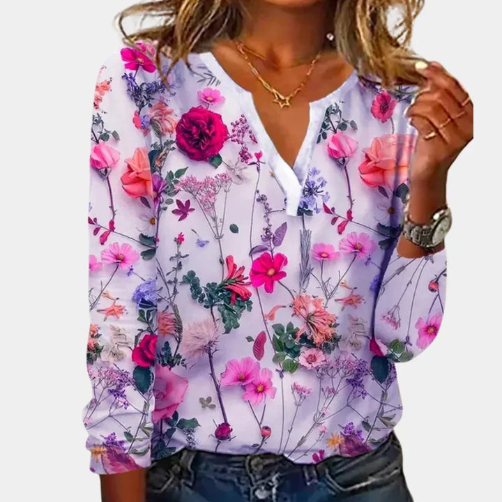 Casual women's blouse with vibrant floral print. Versatile long sleeve top for everyday, spring & summer styles.
