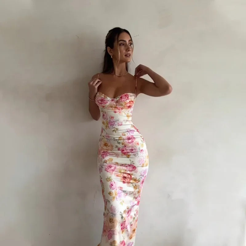 Elegant women's floral print maxi dress with adjustable straps, perfect for summer parties or vacation.