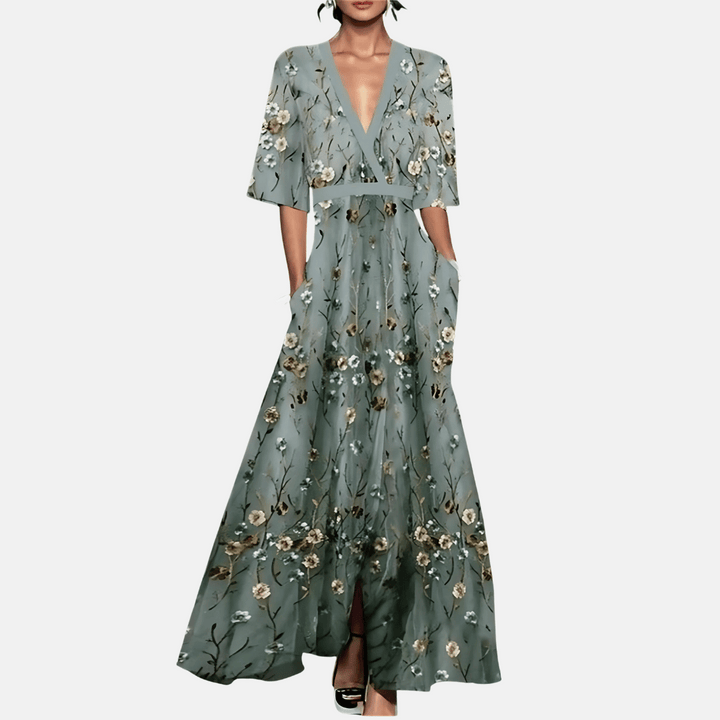 Elegant women's floral print maxi dress with V-neck, perfect for summer casual wear or vacation outfits.