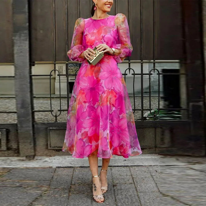 Elegant women's floral print midi dress in blue & pink, perfect for chic summer parties & spring events.