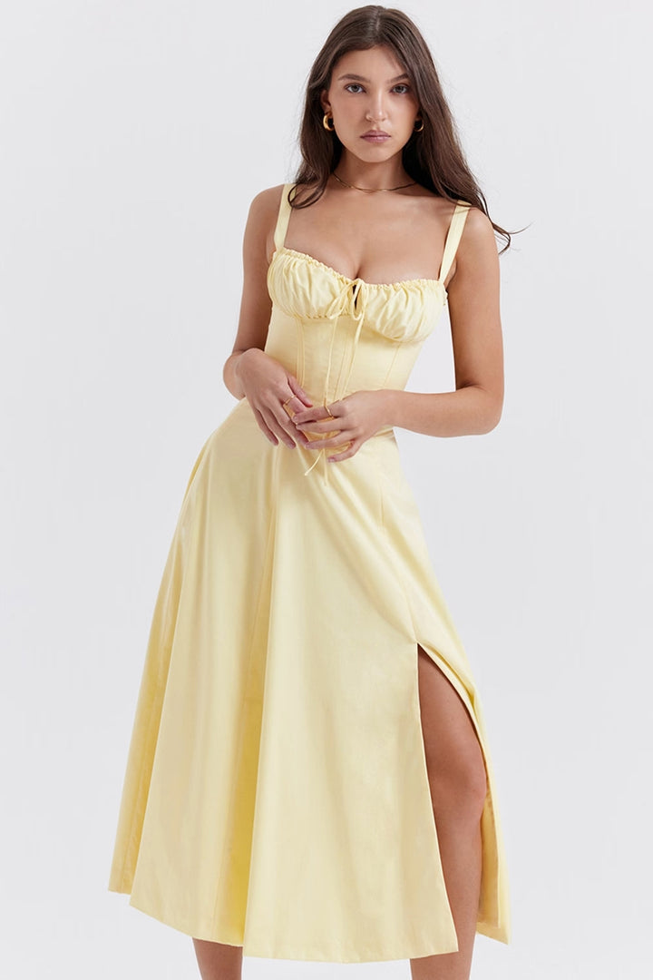 Women's elegant spring midi dress featuring a delicate floral print, perfect for parties.