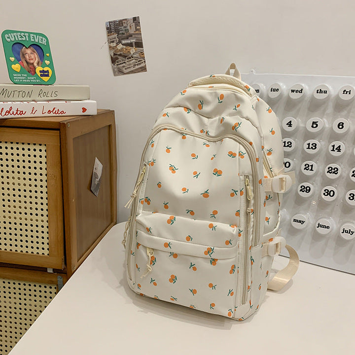Elegant women's floral print school backpack, stylish & durable for students, perfect daypack for books.