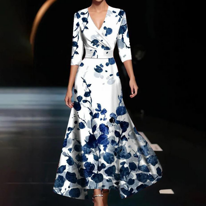 Flowy floral print V-neck wrap dress for women, featuring a beautiful pattern & comfortable 3/4 sleeves.