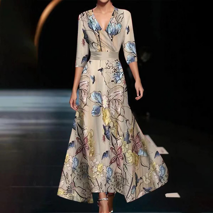 Stylish women's floral wrap dress with an elegant print, V-neck, and flowy silhouette, ideal for any occasion.