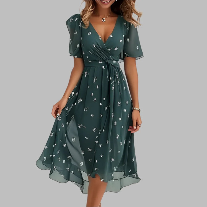 Chic floral ruched midi dress for women, with elegant short sleeves & a beautiful summer party design.