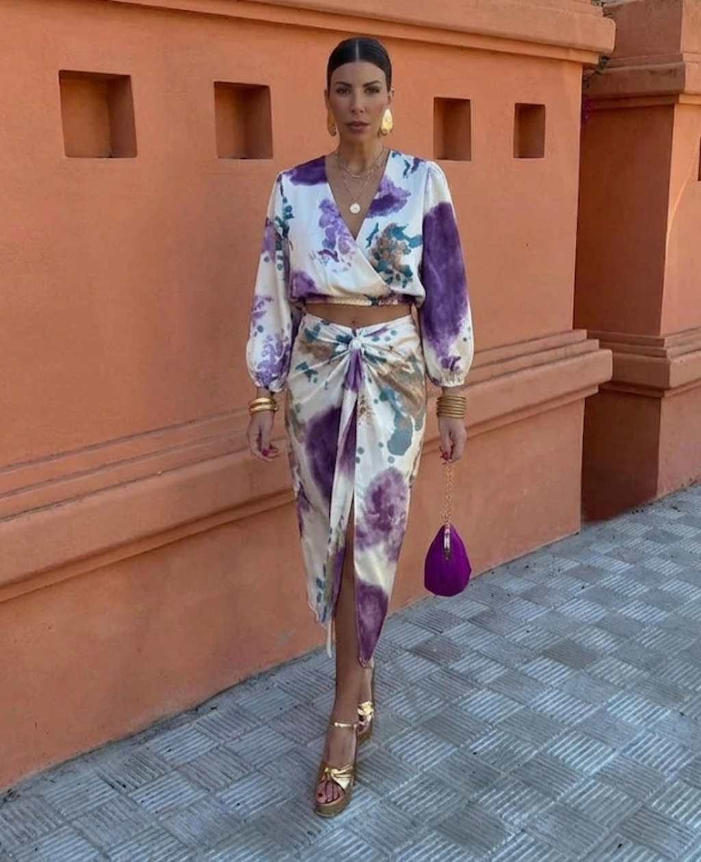 Elegant women's floral summer blouse and midi skirt set. Chic two-piece outfit for a stylish feminine look.