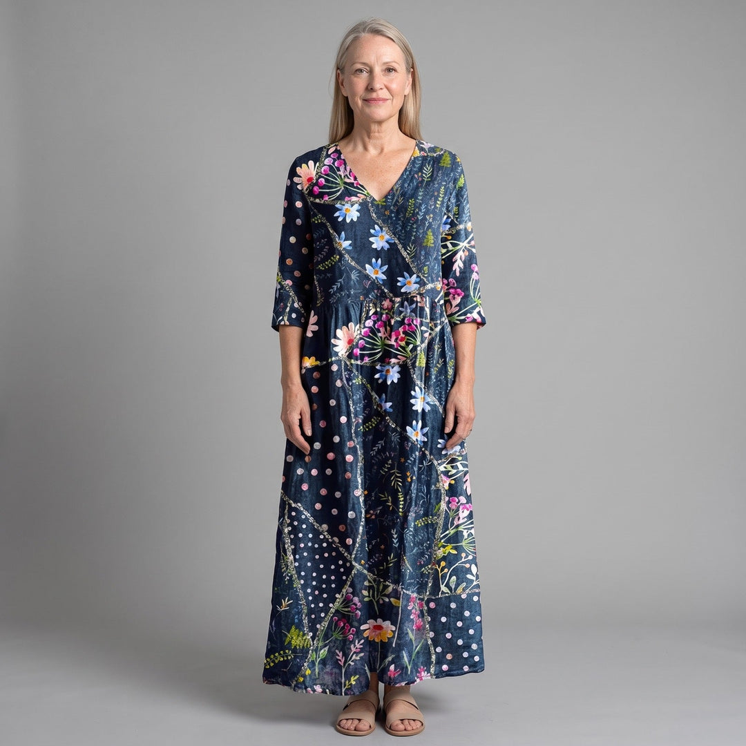 Elegant women's floral summer midi dress with a flowing silhouette, ideal for vacation, parties, or casual wear.