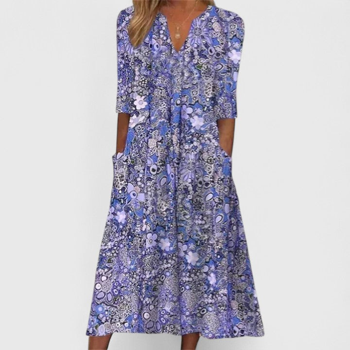 Flattering women's floral summer midi dress, ideal for elegant casual, beach, vacation, or spring party occasions.