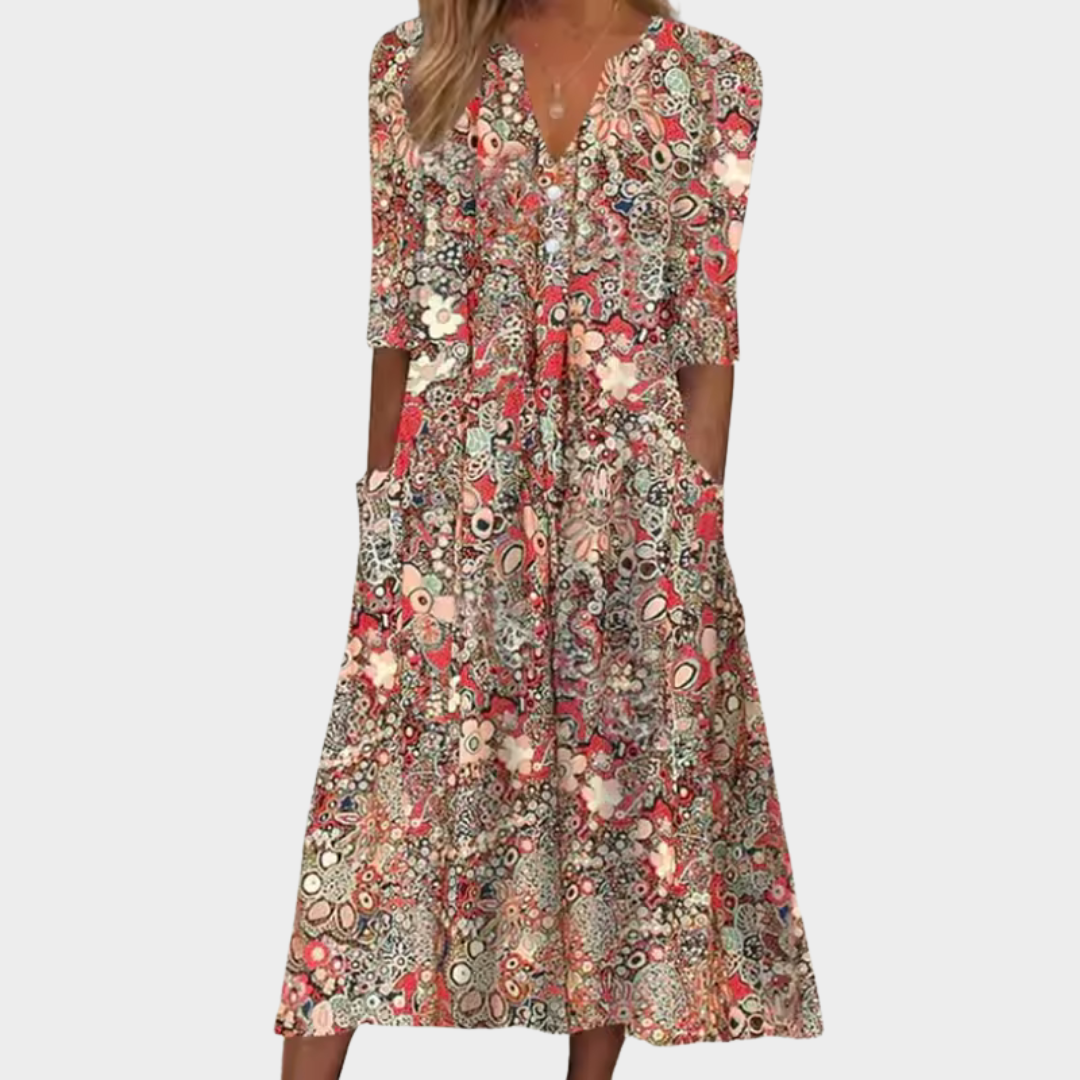Women's summer midi dress featuring a vibrant floral print and flattering silhouette, great for elegant or casual wear.