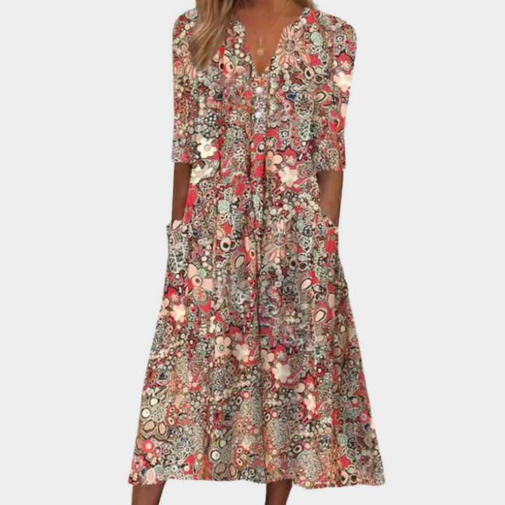Women's summer midi dress featuring a vibrant floral print and flattering silhouette, great for elegant or casual wear.