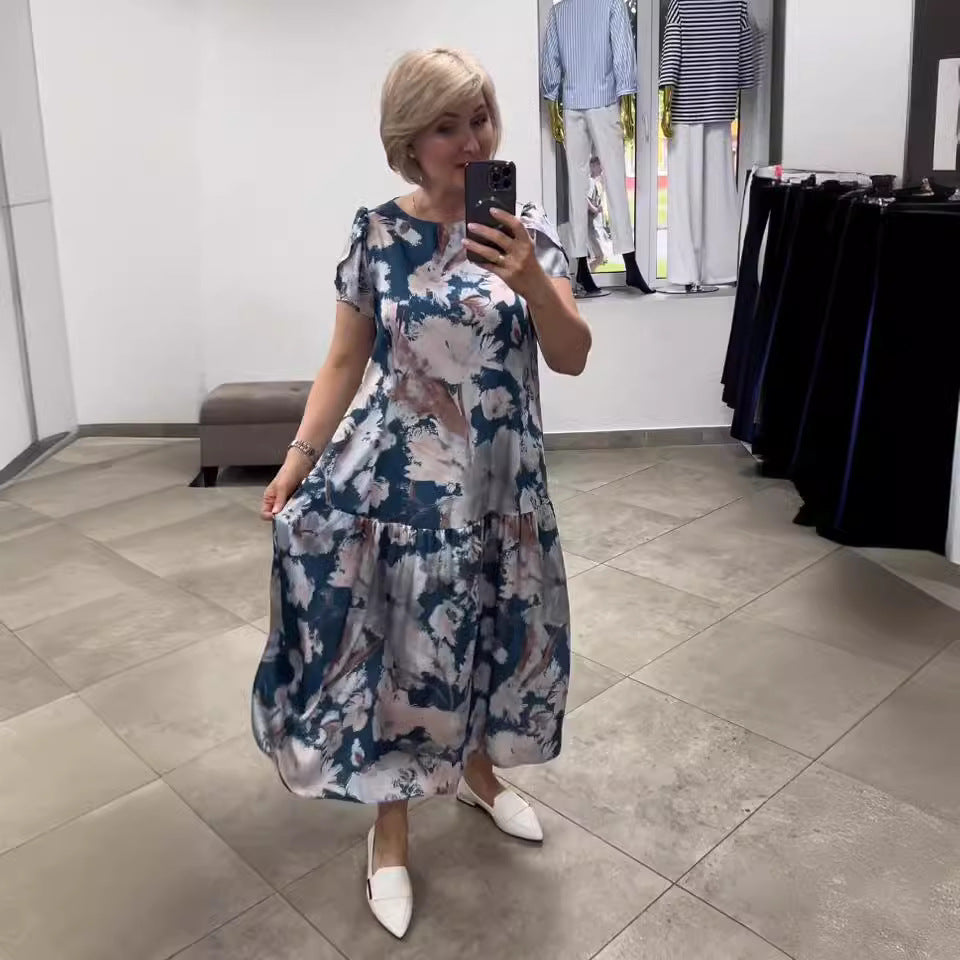 Elegant women's floral tiered maxi dress. Perfect summer style & vacation outfit.