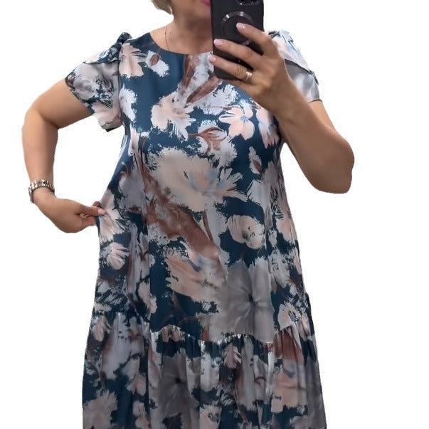 Beautiful floral print tiered maxi dress for women. Comfortable flowy design for elegant summer & resort wear.