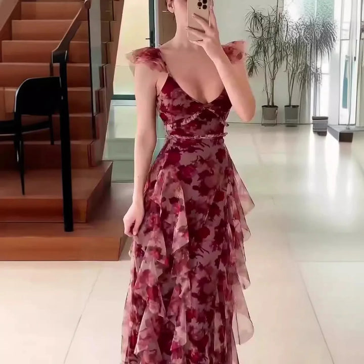 Romantic floral ruffle maxi dress for women, featuring a beautiful tiered skirt. Ideal V-neck long gown for spring fashion.