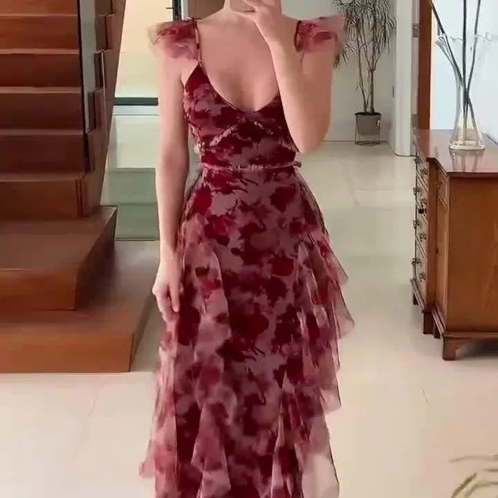 Women's chic floral print tiered maxi dress with elegant ruffles. A stunning long summer dress for any special occasion.