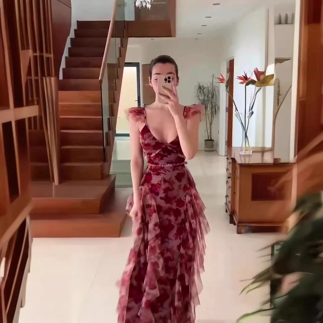 Flowy floral women's maxi dress with romantic ruffles & tiered layers. Ideal elegant long V-neck gown for summer parties.