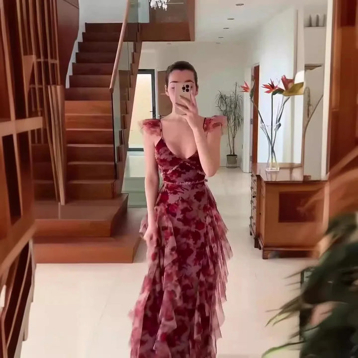 Flowy floral women's maxi dress with romantic ruffles & tiered layers. Ideal elegant long V-neck gown for summer parties.