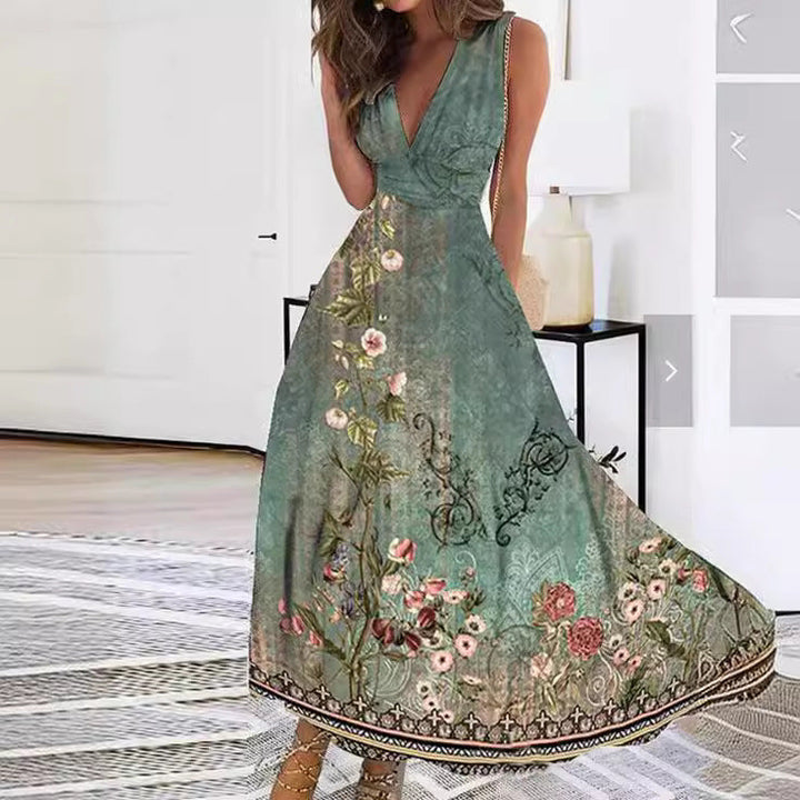 Sleeveless floral print A-line maxi dress with a V-neck, offering elegant spring/summer fashion for women.