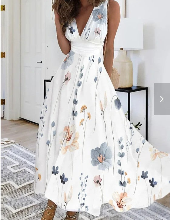 Beautiful spring/summer floral A-line maxi dress for women, featuring a V-neck, perfect for elegant occasion wear.