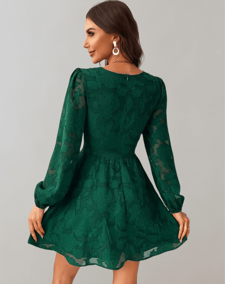 Chic floral print women's long sleeve V-neck cocktail dress. Ideal for elegant party wear.