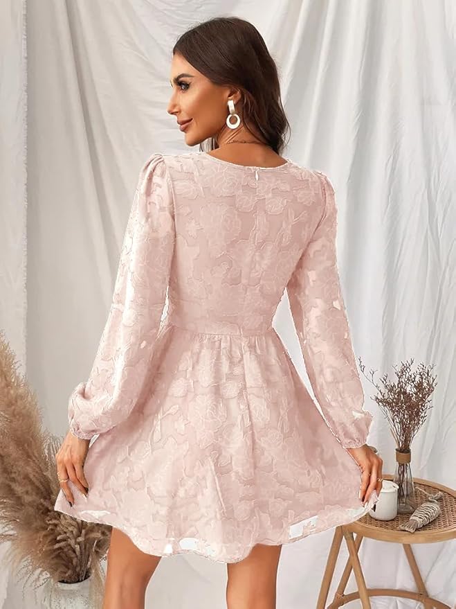 Detailed view of a women's floral V-neck long sleeve cocktail dress, highlighting the elegant pattern.