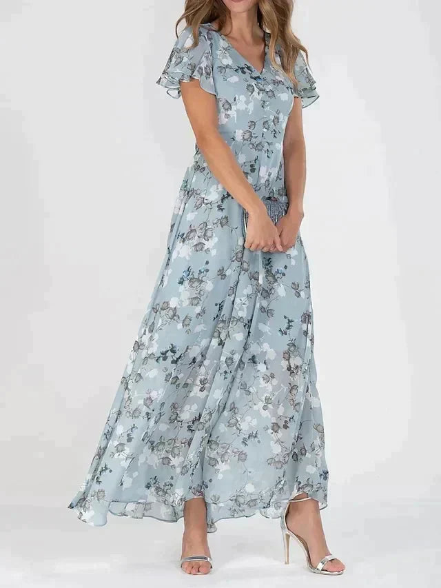 Elegant women's floral V-neck maxi dress, perfect for summer occasions. Flowy and comfortable.
