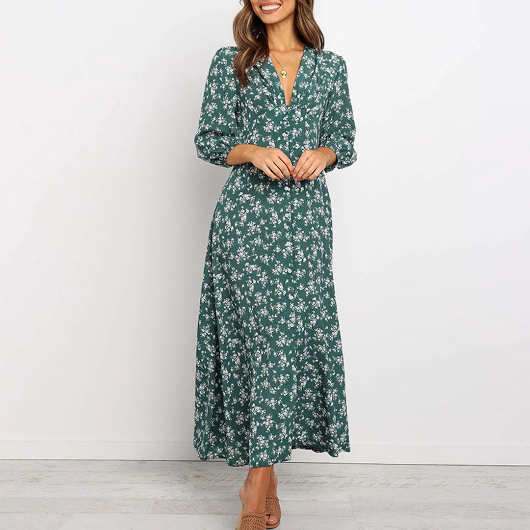 Green floral V-neck women's maxi dress. Stylish & comfortable, ideal for summer casual wear or elegant events.