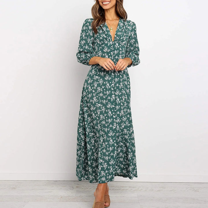 Green floral V-neck women's maxi dress. Stylish & comfortable, ideal for summer casual wear or elegant events.