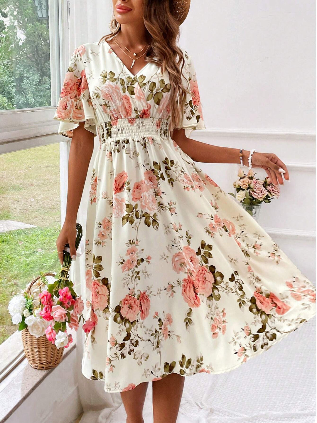 Elegant women's floral V-neck midi dress, perfect for spring/summer casual or party wear.