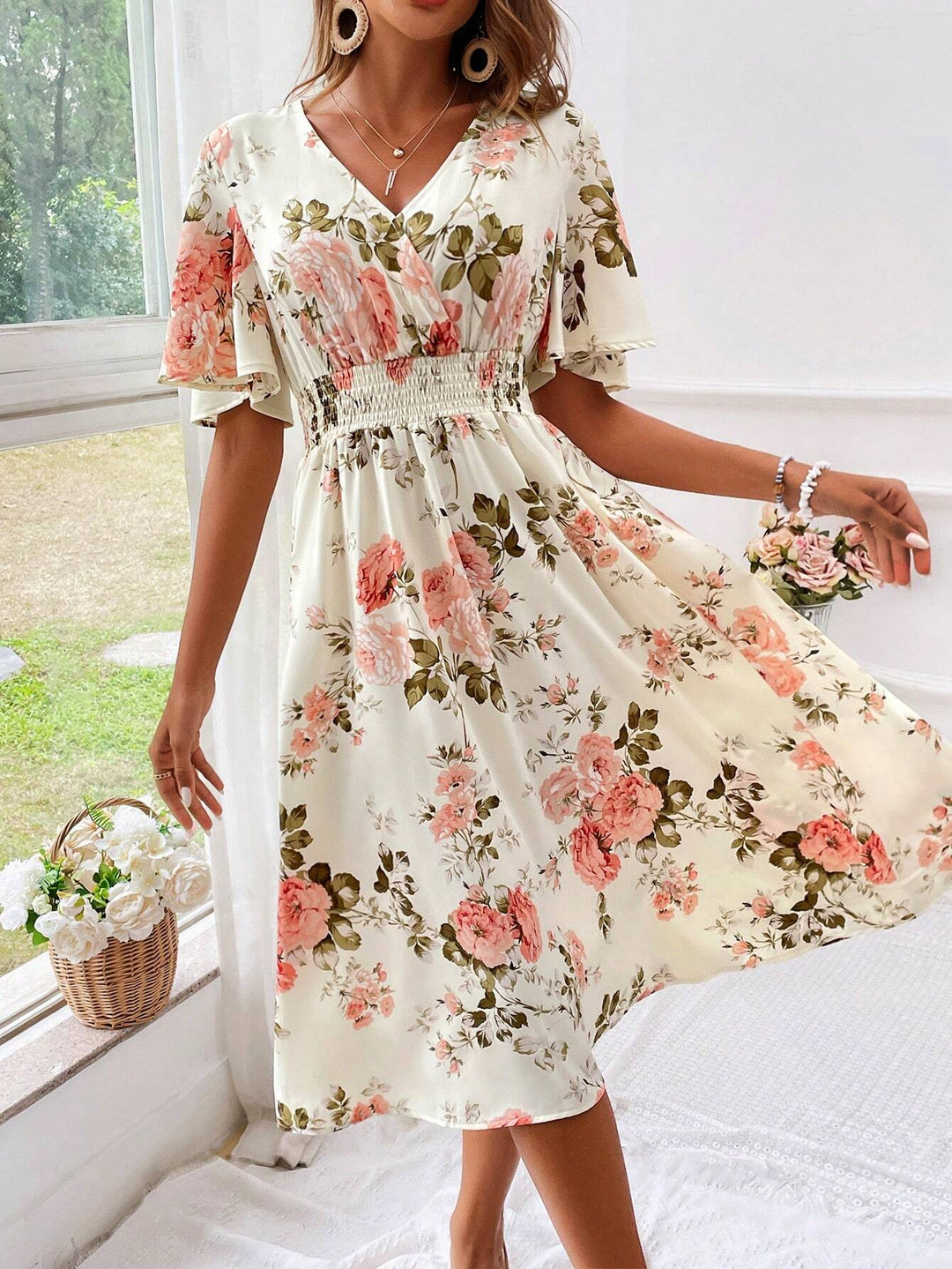 Chic V-neck floral midi dress for women, ideal for elegant spring parties, summer events, or casual outings.