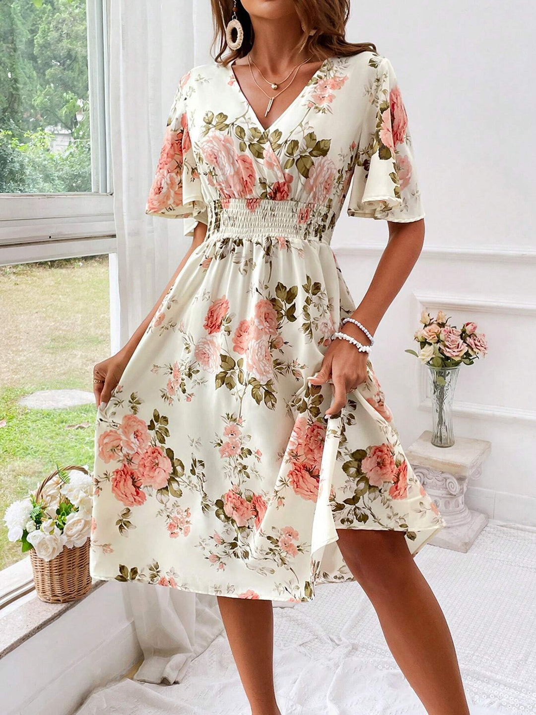 Beautiful women's floral V-neck midi dress, elegant and versatile for summer casual or party occasions.