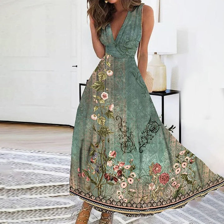 Flowy printed floral maxi dress for women, featuring a stylish V-neck and sleeveless design.