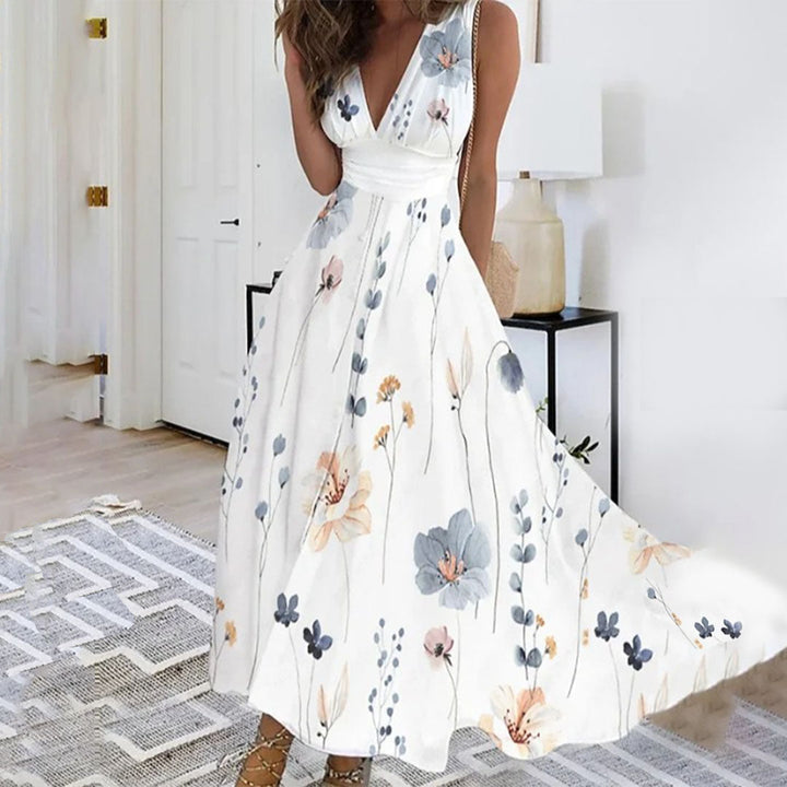 Comfortable women's summer maxi dress with vibrant floral print, V-neck, and sleeveless for vacation.