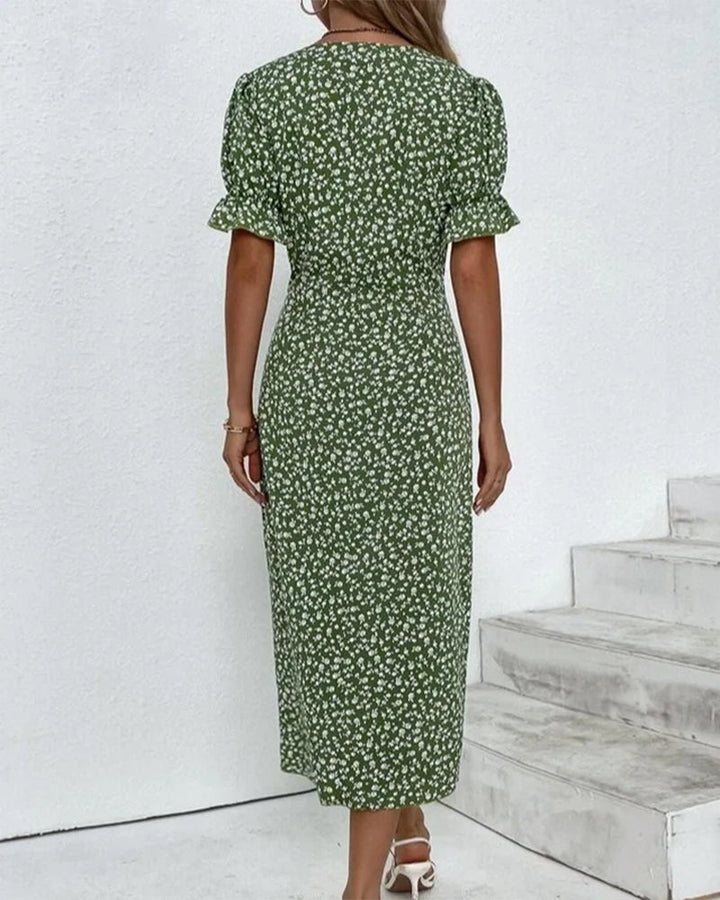 Vibrant floral pattern on an elegant women's V-neck wrap midi dress. Ideal long sleeve summer dress.
