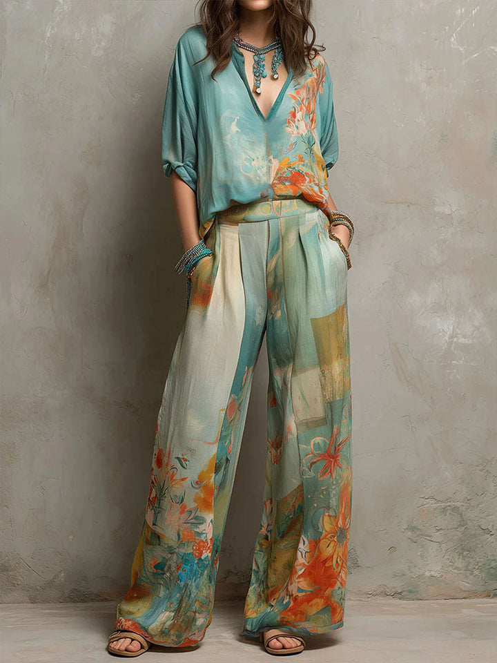 Elegant women's floral wide-leg two-piece set for spring/summer resort wear. Comfortable & versatile fashion outfit.