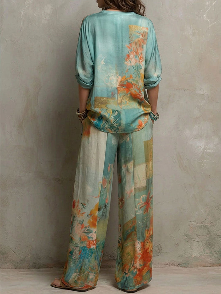 Vibrant floral print on a women's wide-leg two-piece set, perfect for elegant summer fashion and resort outfits.
