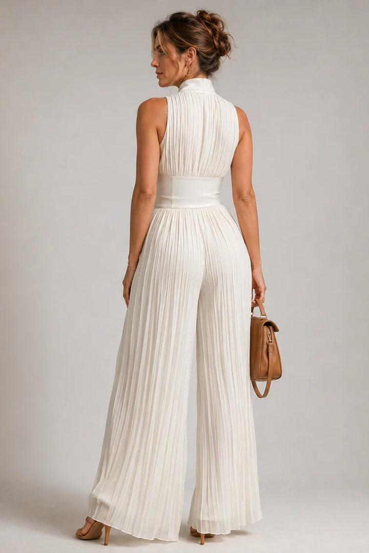 Beautiful floral print jumpsuit with a V-neck and wide-leg design, perfect for feminine party wear.