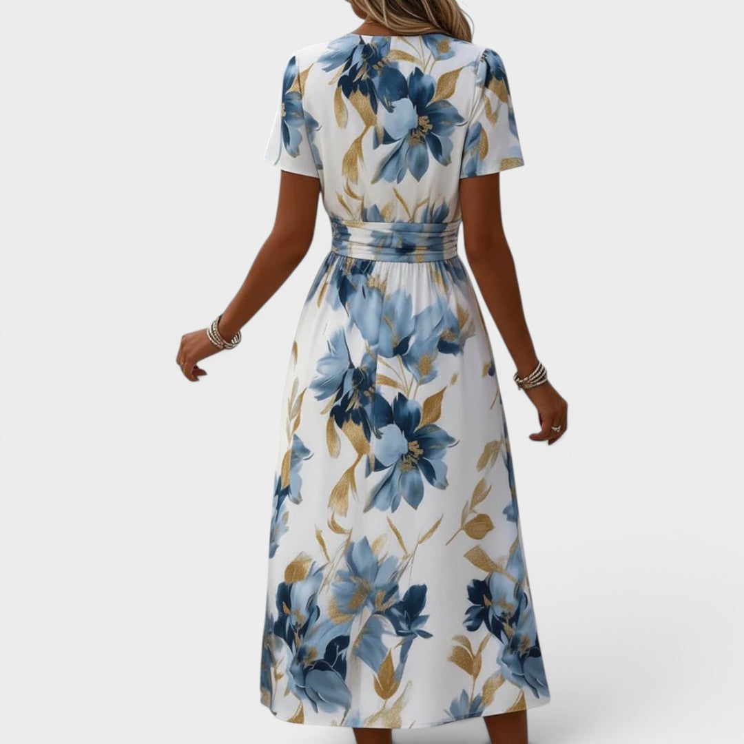 Stylish women's floral wrap midi dress, styled for a summer party. Elegant day dress for various occasions.