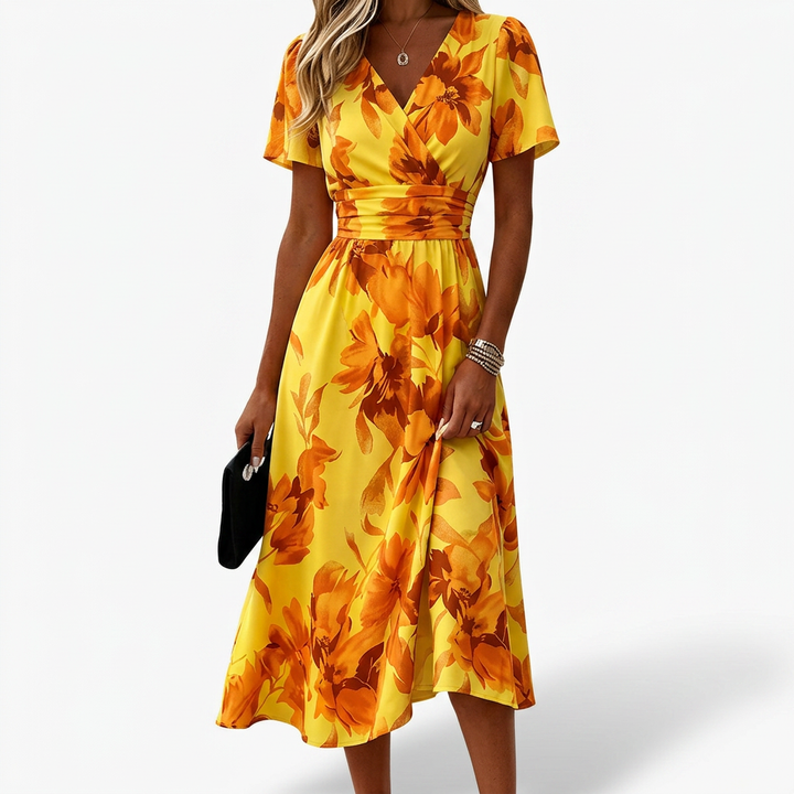 Feminine floral print wrap midi dress with V-neck & short sleeves, ideal for summer day or party wear.
