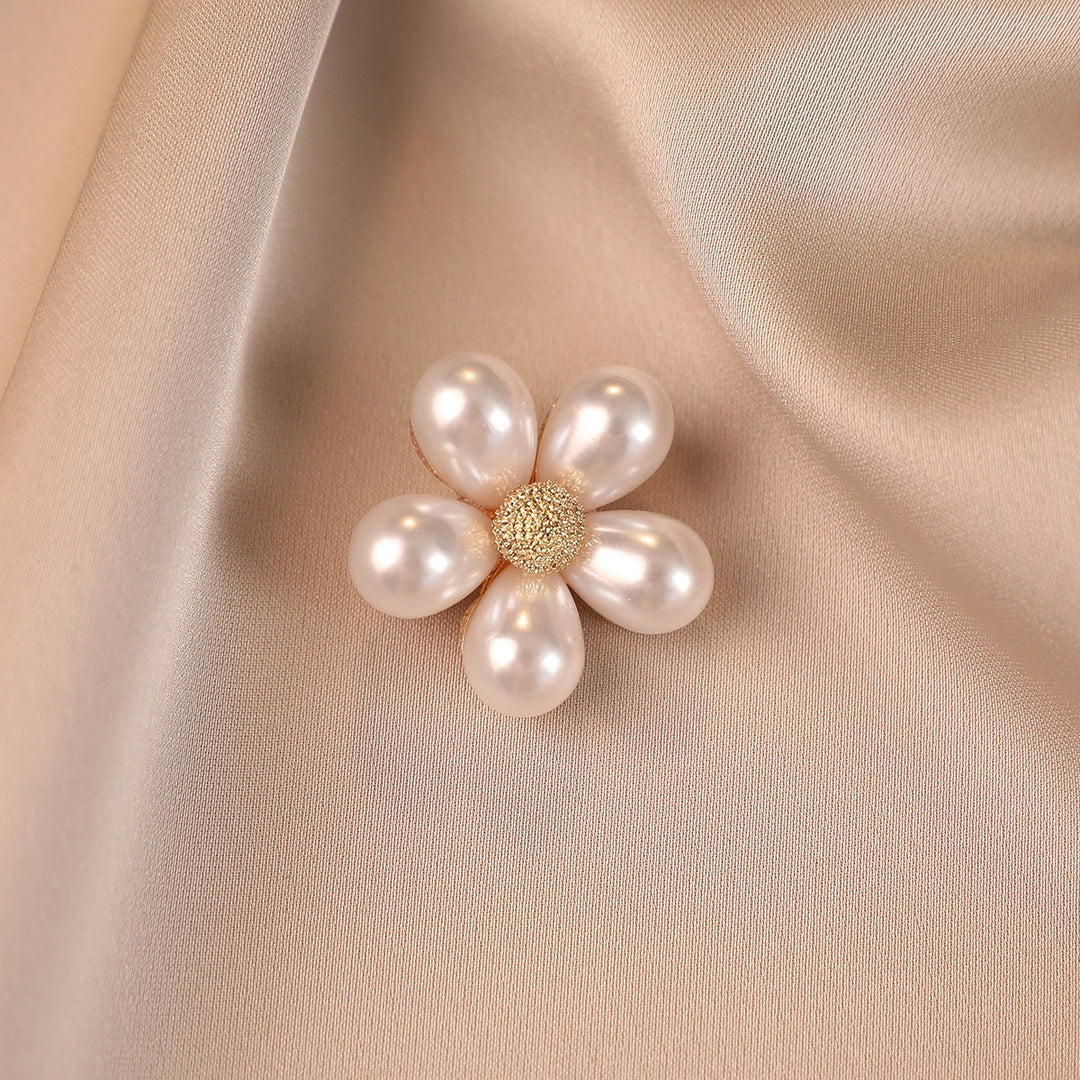 Elegant women's flower brooch with faux pearls, a stylish floral accessory for dresses or jackets.