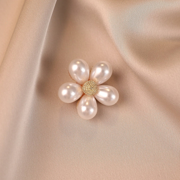Elegant women's flower brooch with faux pearls, a stylish floral accessory for dresses or jackets.