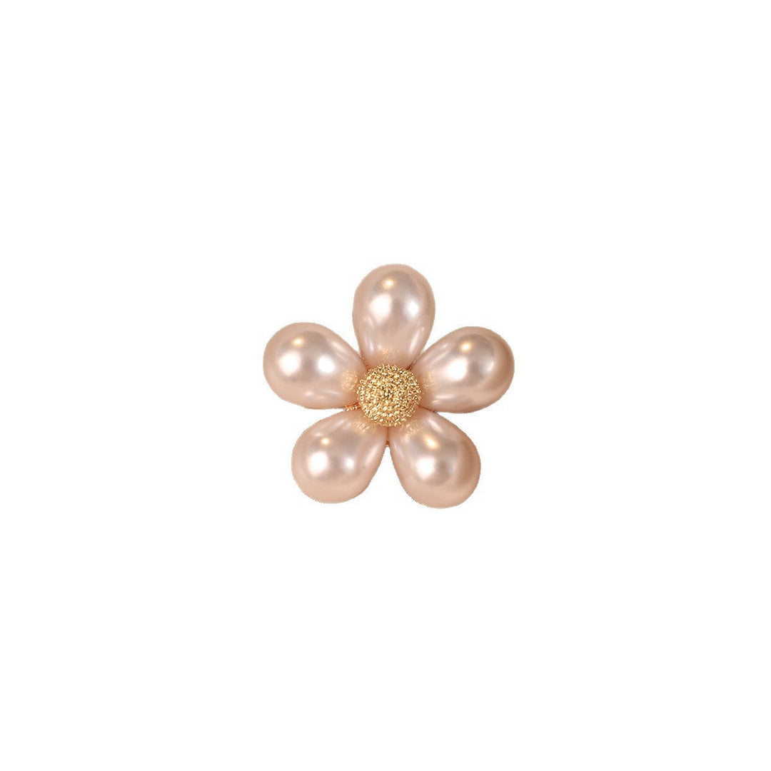 Stunning flower and pearl brooch, a sophisticated floral accessory for women's evening wear or business attire.