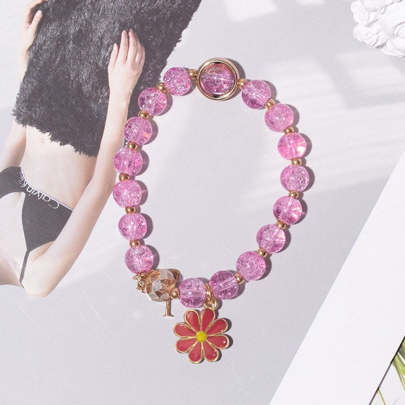 Gift-ready women's flower charm bracelet, a sparkling and elegant present.
